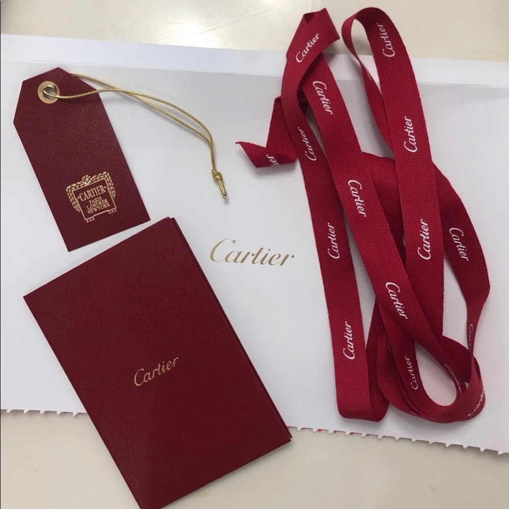 Cartier receipt folder, ribbon, and tag